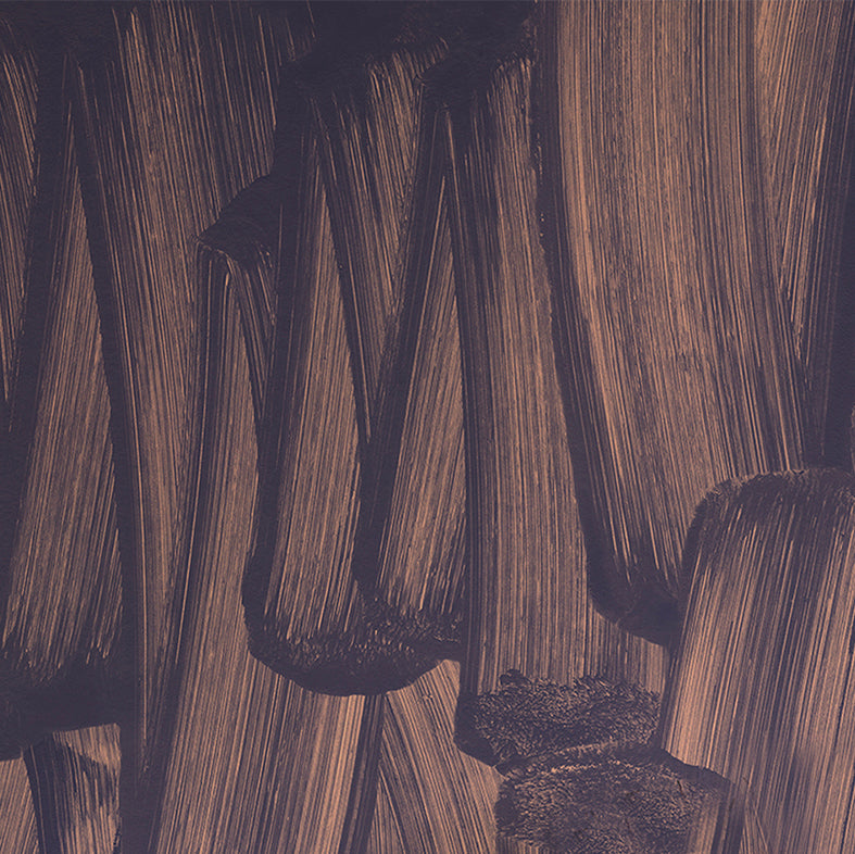 Detail of wallpaper in an abstract paint print in dark grey on a purple field.