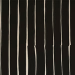 Detail of wallpaper in a playful irregular stripe print in cream on a black field.