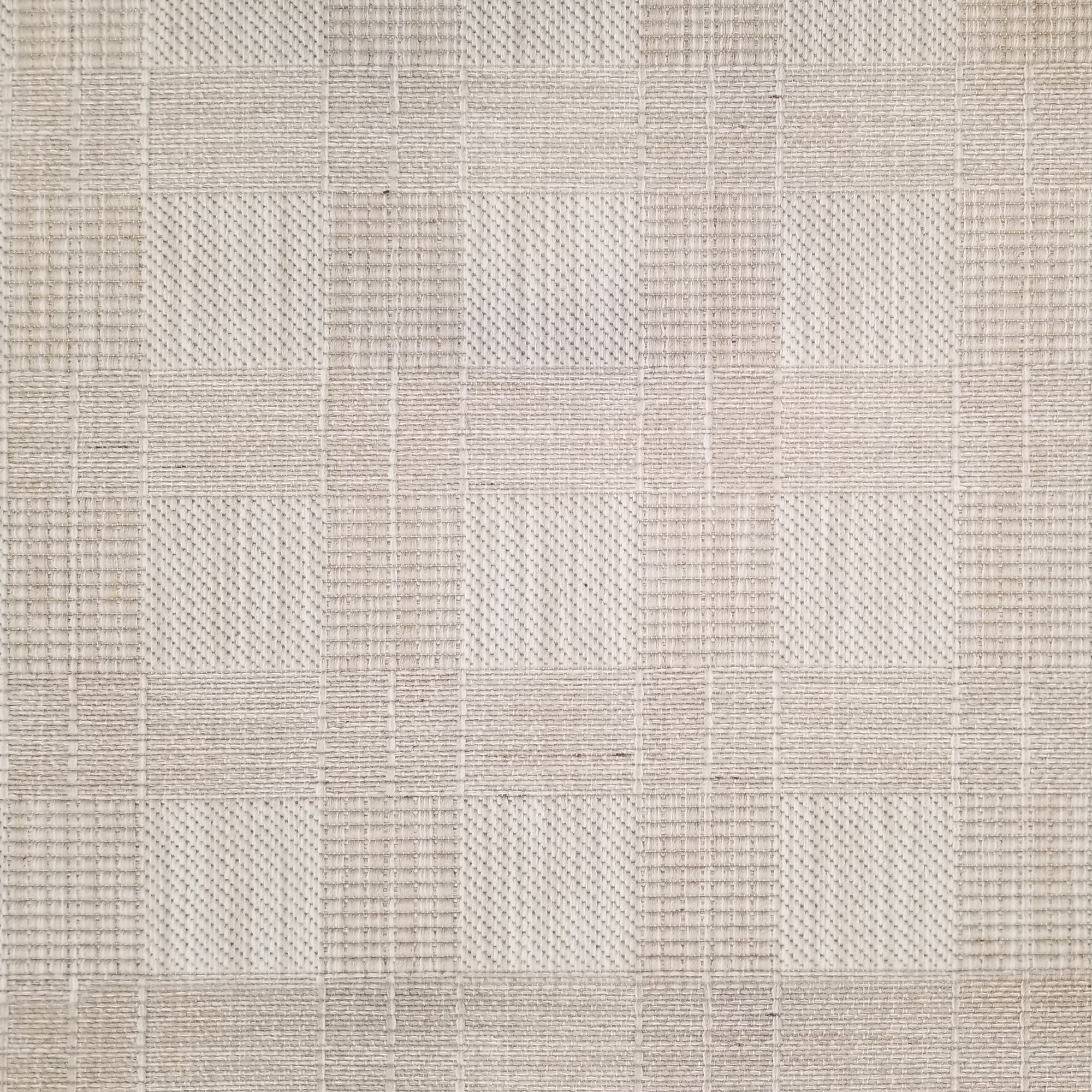 Textured beige and brown checkered broadloom carpet