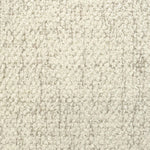 Broadloom carpet in cream bouclé with beige accents. 