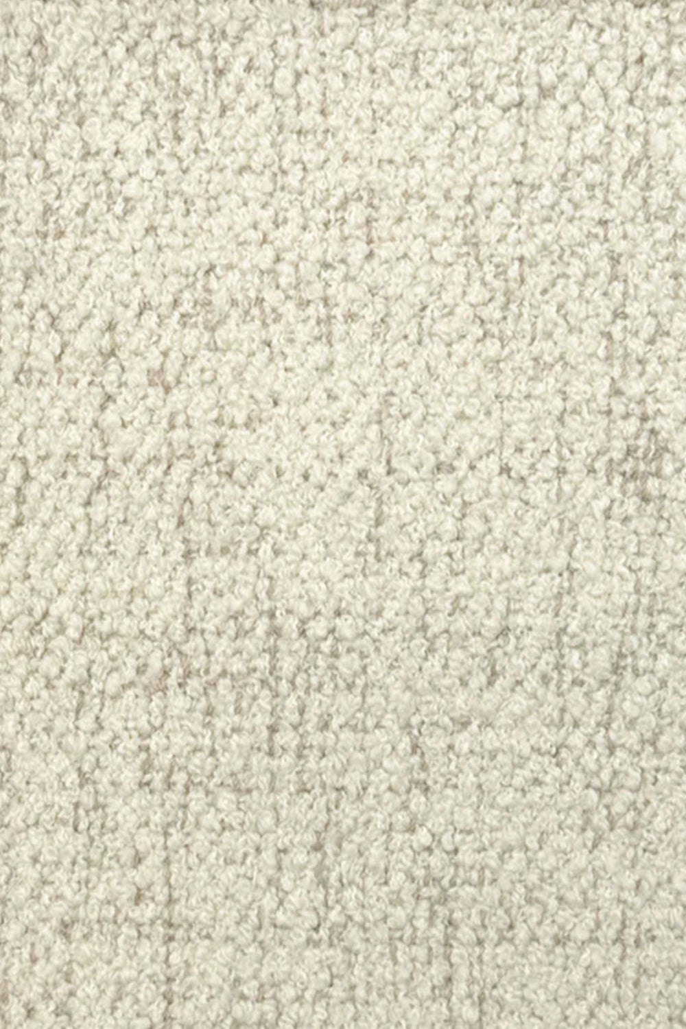Broadloom carpet in cream bouclé with beige accents. 