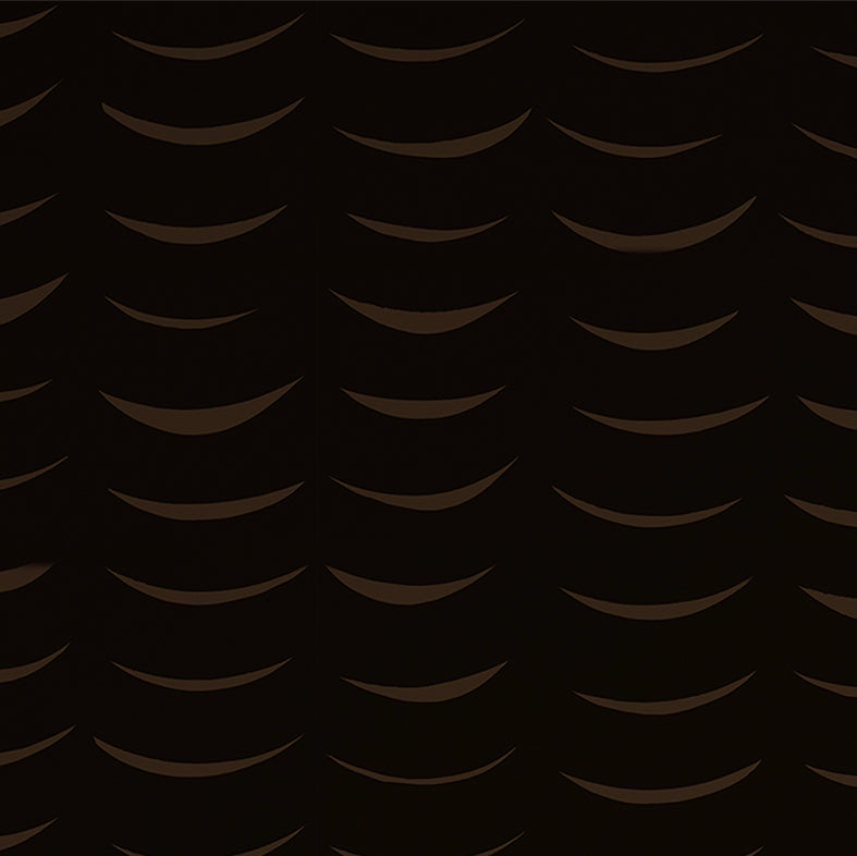 Detail of wallpaper in an abstract crescent print in brown on a black field.