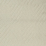 Broadloom carpet with dimensional diamond pattern in cream.
