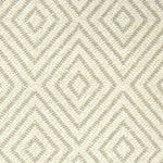 Broadloom carpet with dimensional diamond pattern in cream with beige. 