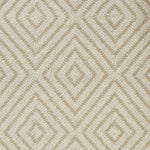 Broadloom carpet with dimensional diamond pattern in cream with tan. 