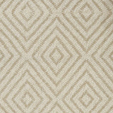 Broadloom carpet with dimensional diamond pattern in cream with tan. 