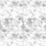 Wallpaper panels in a repeating scalloped print in shades of gray and white.