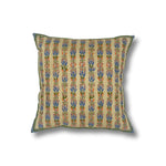 Throw pillow with printed and embroidered floral stripe design in pastel pink, purple and blue and green accents on a white field. 