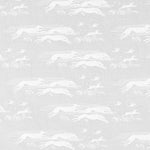 Detail of fabric in a running whippet print in white on a light gray field.