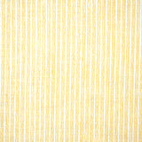 Detail of fabric in a wiggly stripe print in yellow on a white field.