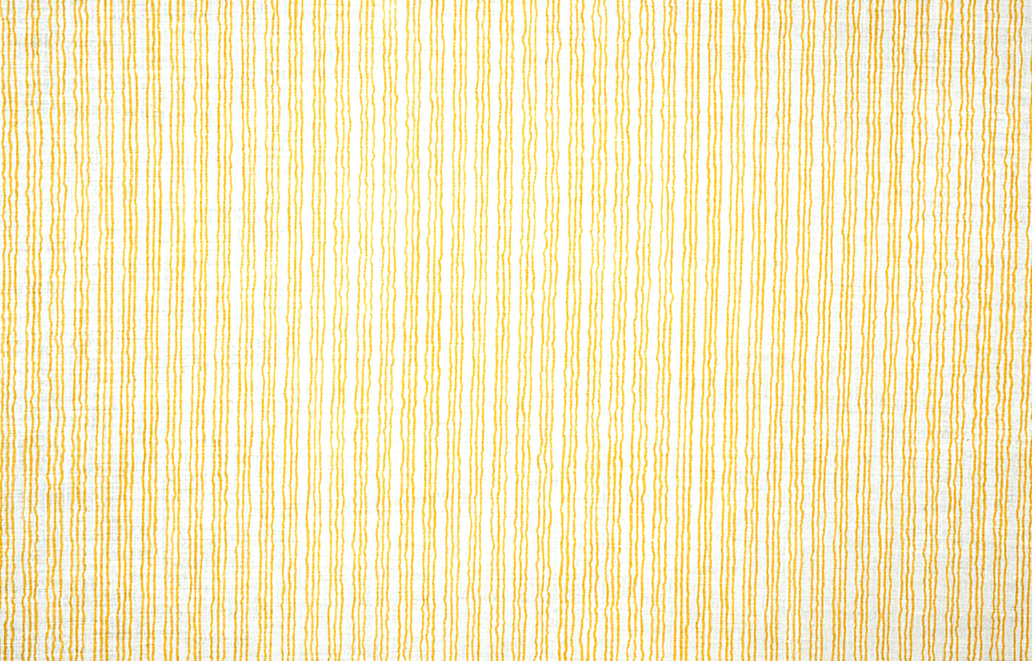 Detail of fabric in a wiggly stripe print in yellow on a white field.