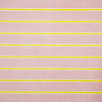 Detail of fabric in a horizontal striped print in yellow and white on a pink field.