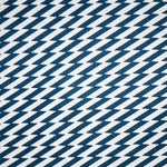 Detail of fabric in a zigzag stripe print in navy on a white field.