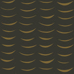 Detail of wallpaper in an abstract crescent print in brown on a black field.