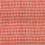 Detail of fabric in a small-scale geometric stripe print in red and white.