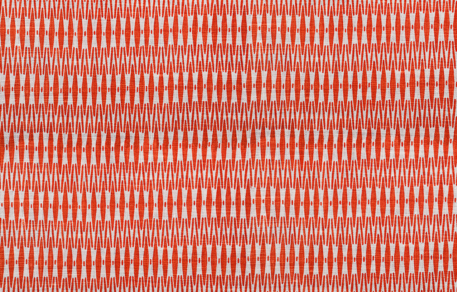 Detail of fabric in a small-scale geometric stripe print in red and white.