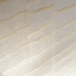 Wide-angle shot of wallpaper in an abstract textural pattern in metallic pink and cream.