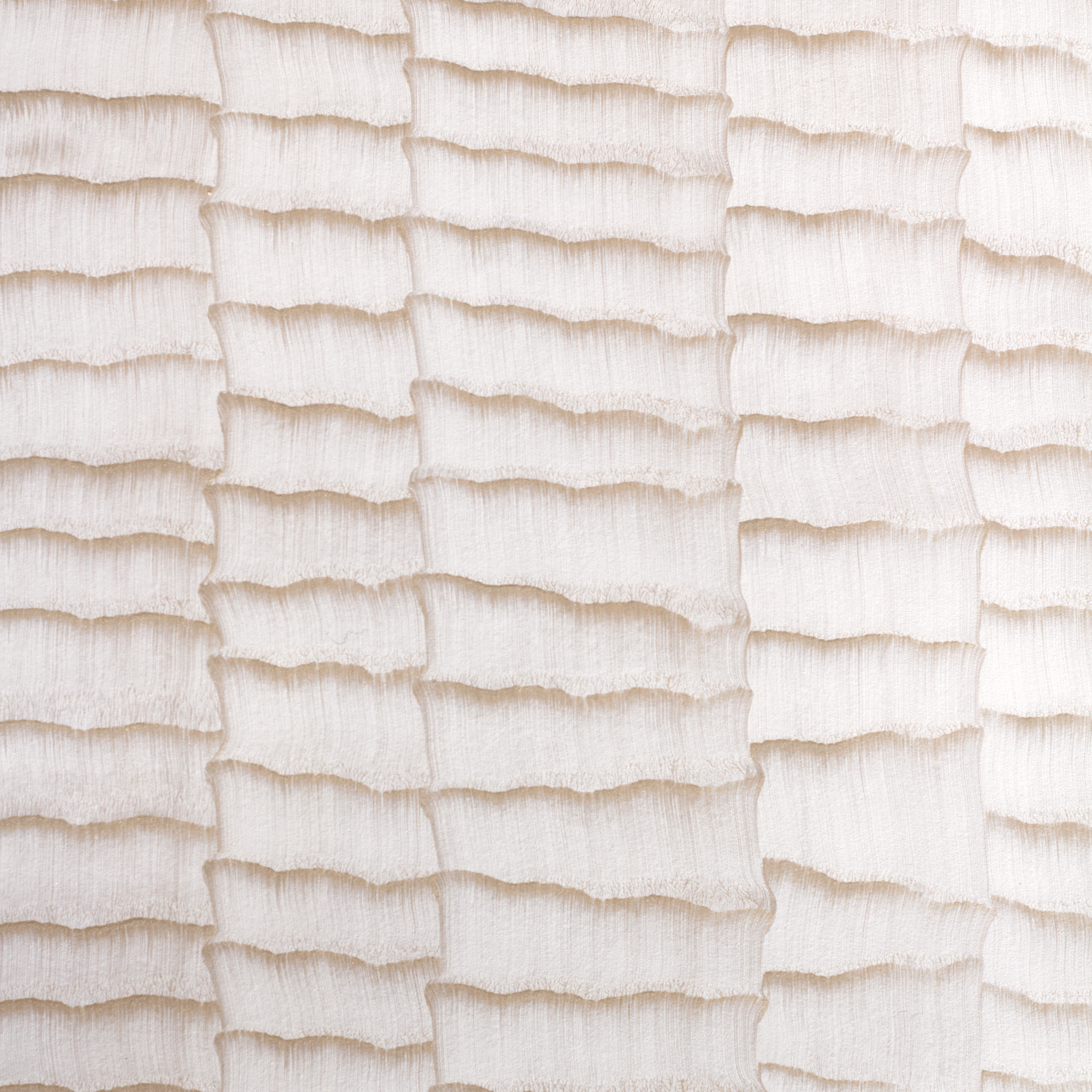 Detail of wallpaper in an abstract textural pattern in metallic pink and cream.