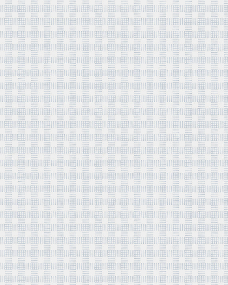 Wallpaper detail in a dense plaid pattern in shades of light blue and cream.