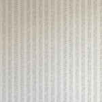 Detail of wallpaper in a repeating striped circular print in gray on a light gray field.