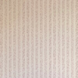 Detail of wallpaper in a repeating striped circular print in purple on a cream field.