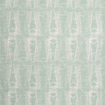 Detail of fabric in an abstract geometric print in light green and gray.