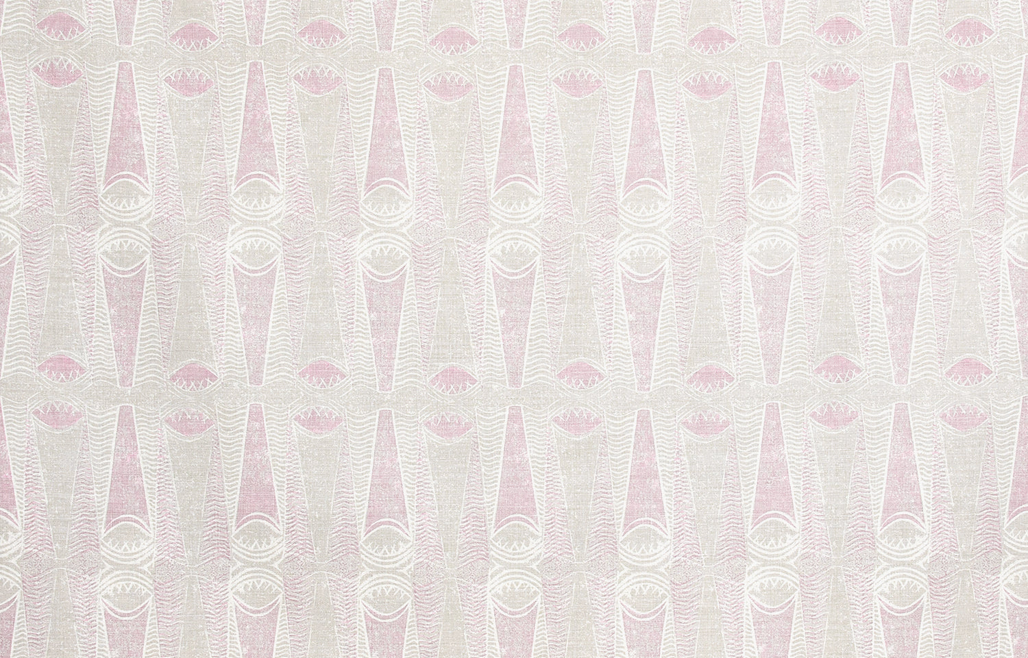 Detail of fabric in an abstract geometric print in light pink and green.
