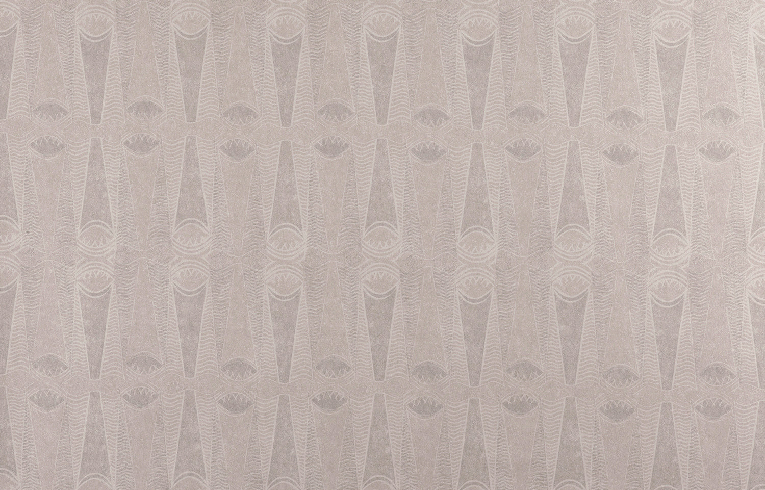 Detail of wallpaper in an abstract geometric print in gray and tan.