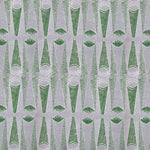 Detail of wallpaper in an abstract geometric print in gray and green.