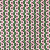 Detail of fabric in a playful curving stripe print in pink, purple and white on a green field.