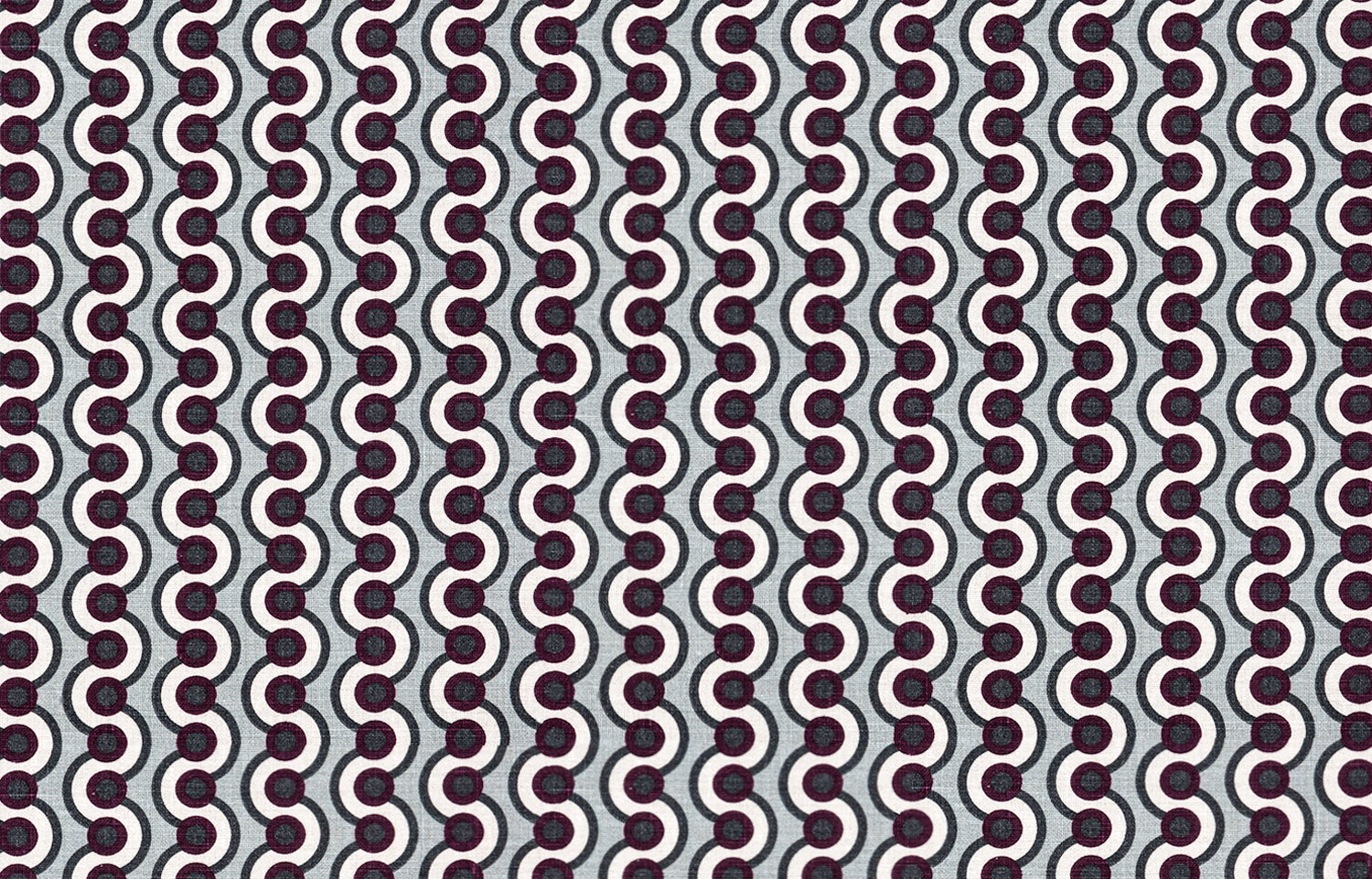 Detail of fabric in a playful curving stripe print in gray, purple and white on a light gray field.