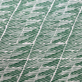 Detail of fabric in a textural geometric stripe in green on a cream field.