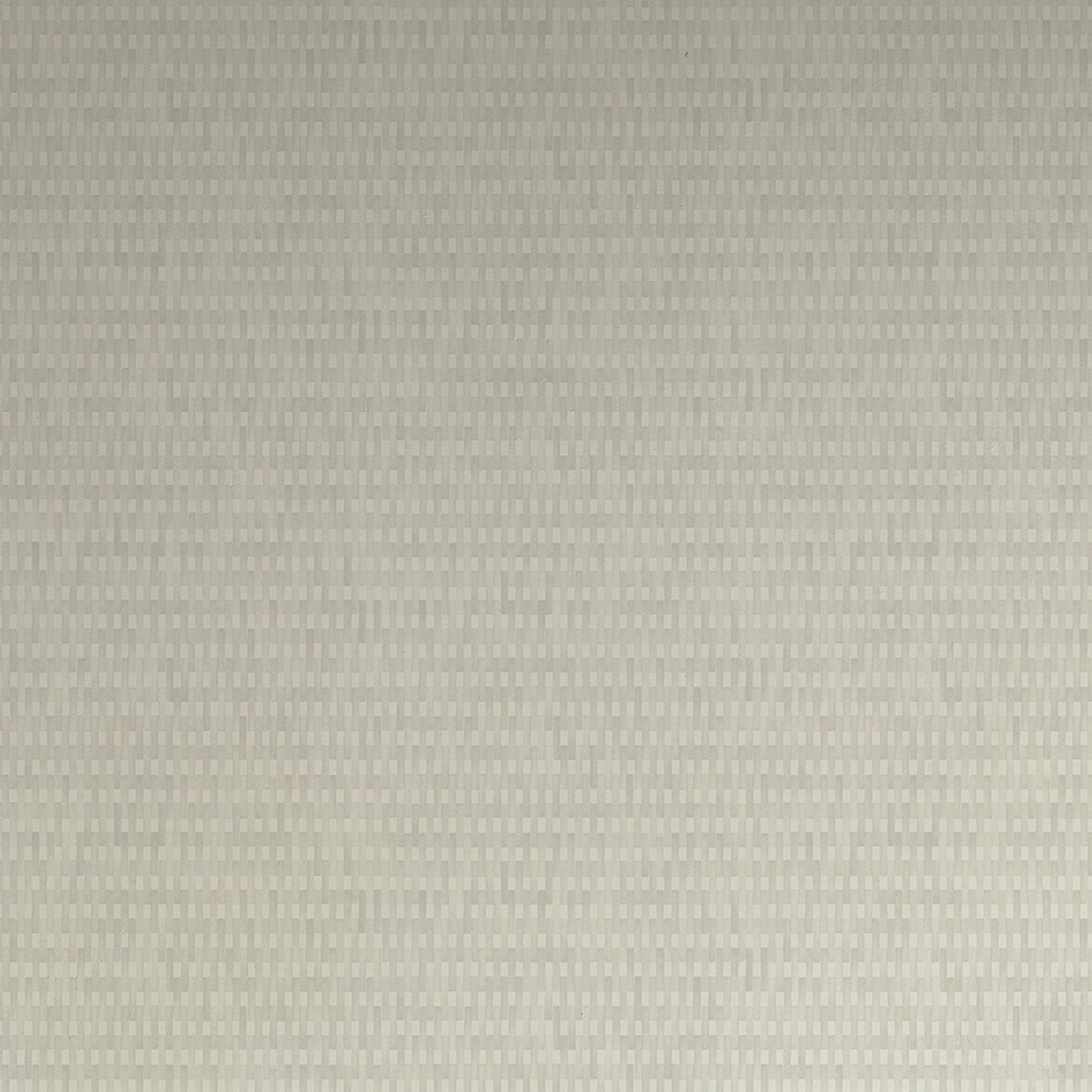Detail of wallpaper in a textural grid print in shades of gray. 