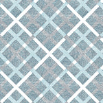 Detail of fabric in a dotted plaid pattern in shades of blue and black on a white field.