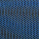 Detail of fabric in a playful curving stripe in gray on a navy field.