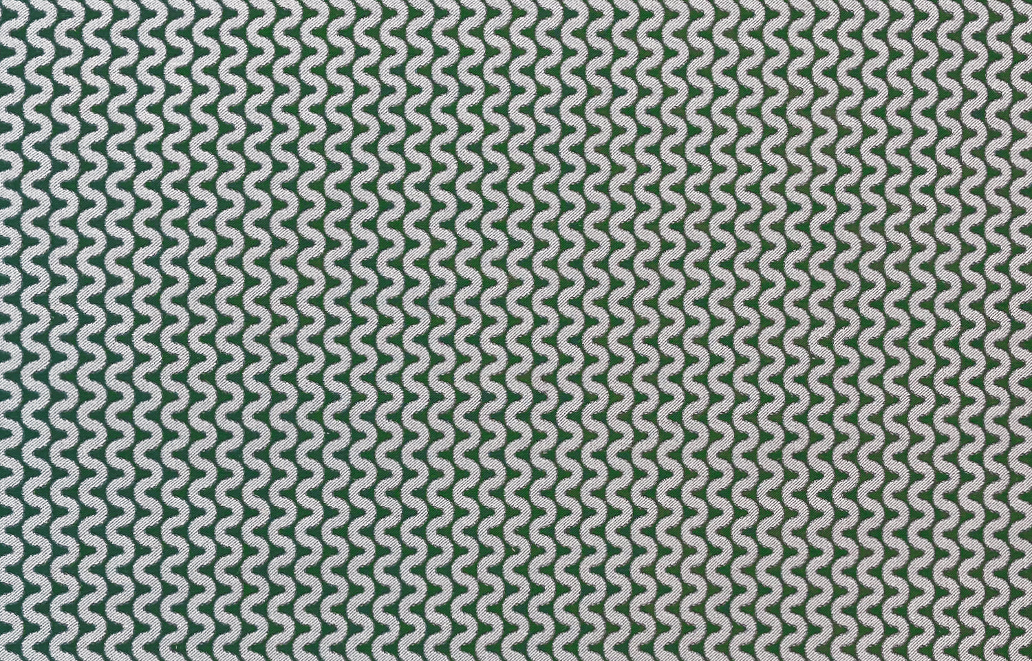 Detail of fabric in a playful curving stripe in cream on a green field.