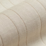 Draped woven fabric in a ivory and oatmeal stripe.