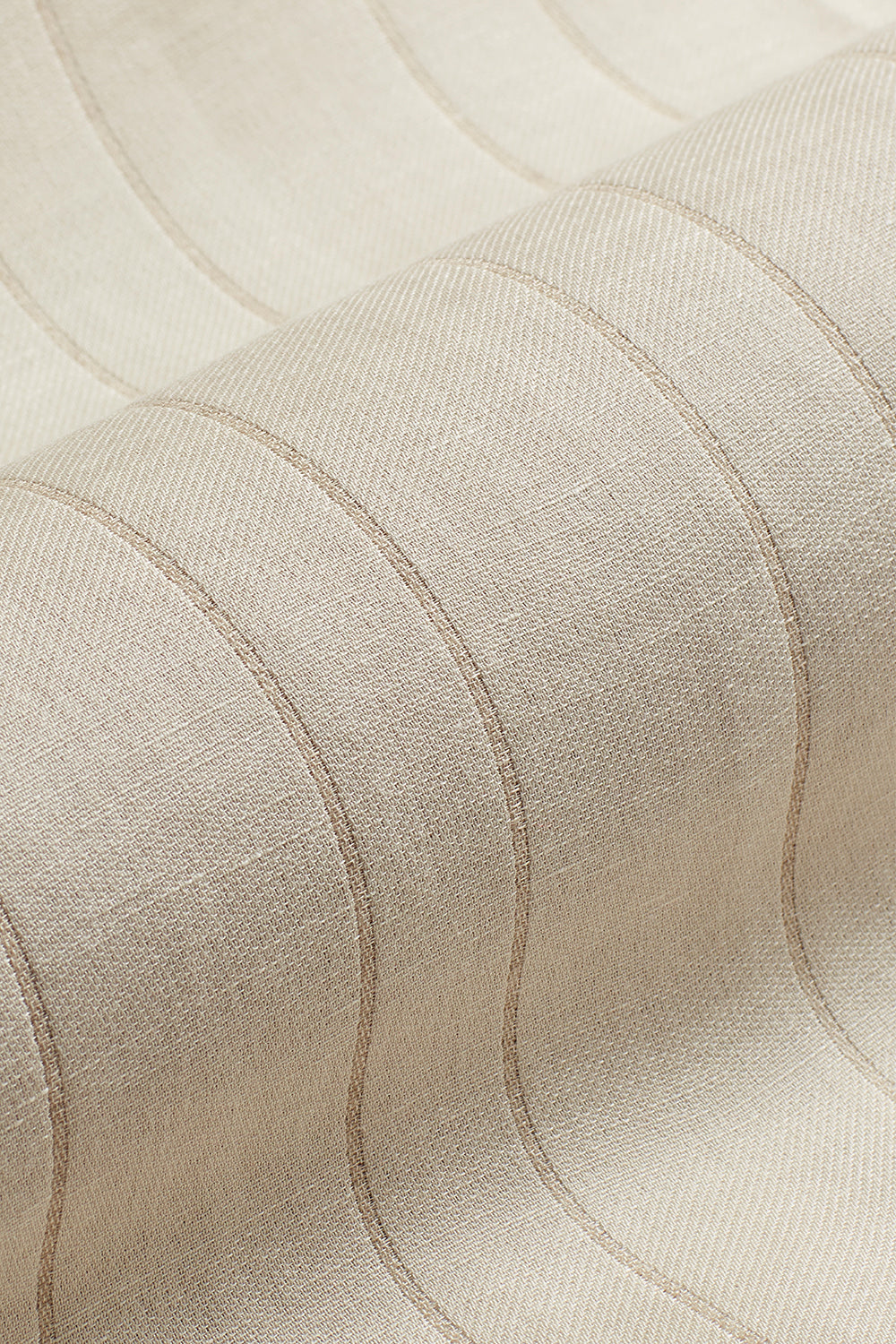 Draped woven fabric in a ivory and oatmeal stripe.