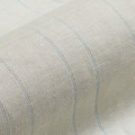 Draped woven fabric in a ivory and pale blue stripe.