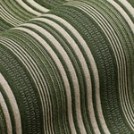 Draped woven fabric in a mixed width stripe design in ivory and forest green.