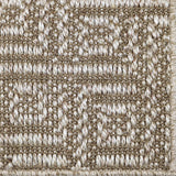 Close-up of a key pattern carpet in ecru.
