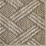 Close up of a woven lattice design carpet in ecru.