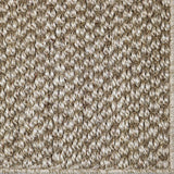 Close-up of a textured sisal carpet in ecru.