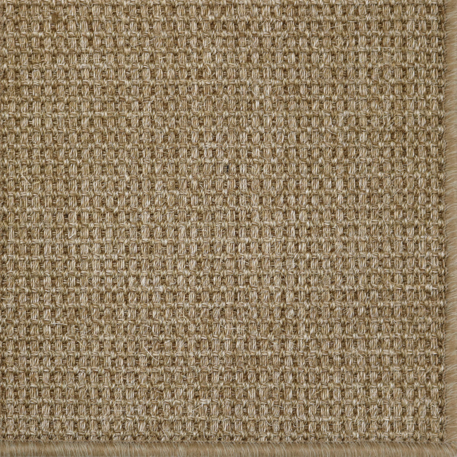 Close-up of a textured beige carpet