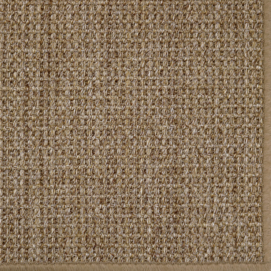 Close-up of a textured brown carpet 