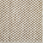 Close-up of a textured woven broadloom in beige. 