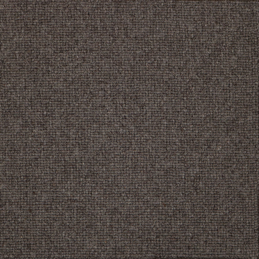 Broadloom carpet swatch in a solid pattern brown color
