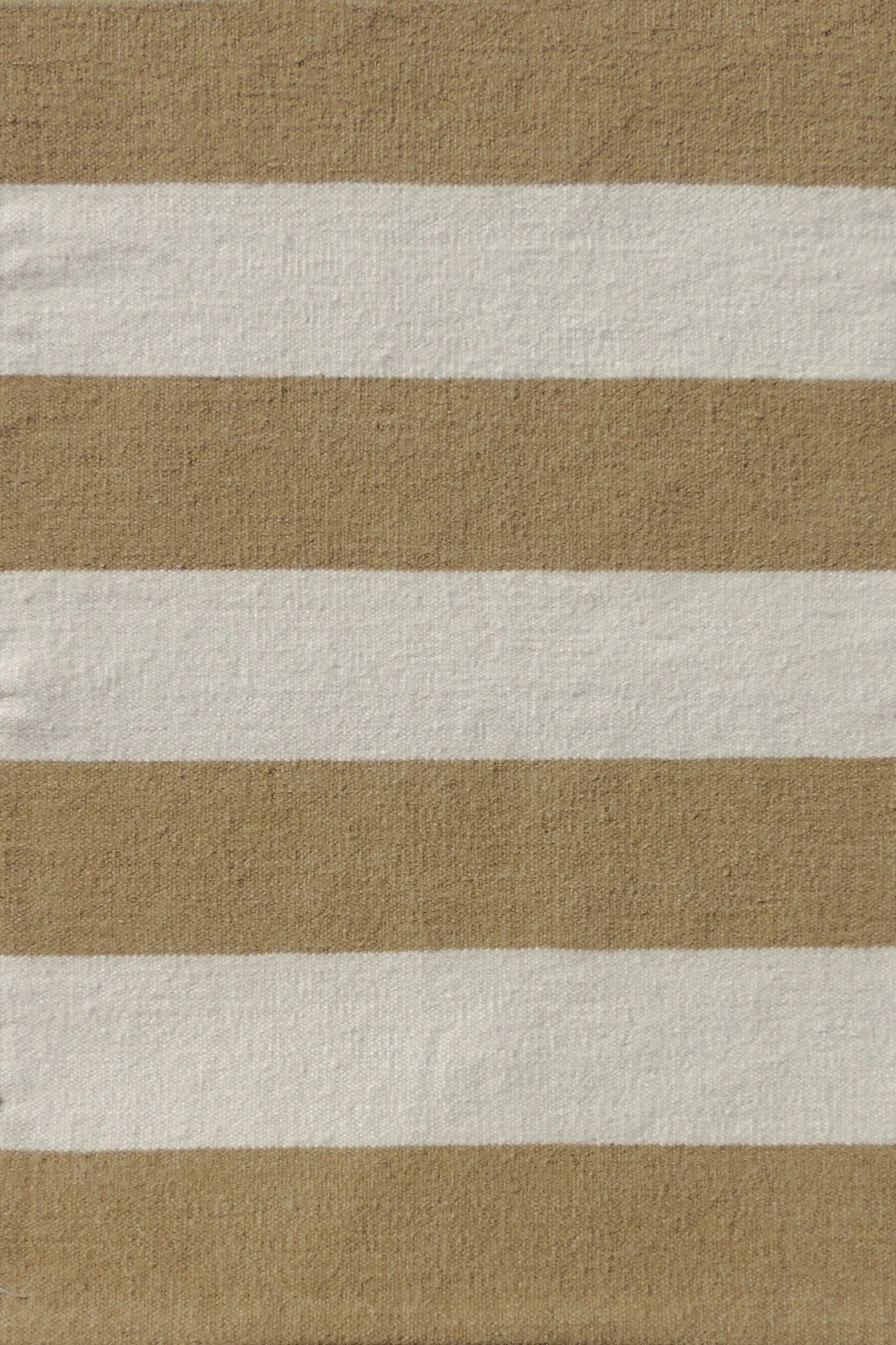 Handwoven rug with wide stripes in cream and tan. 