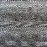 Handknotted rug with small scale geometric pattern in dark brown and ivory. 