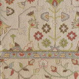 Decorative floral patterned rug with intricate design on a beige background